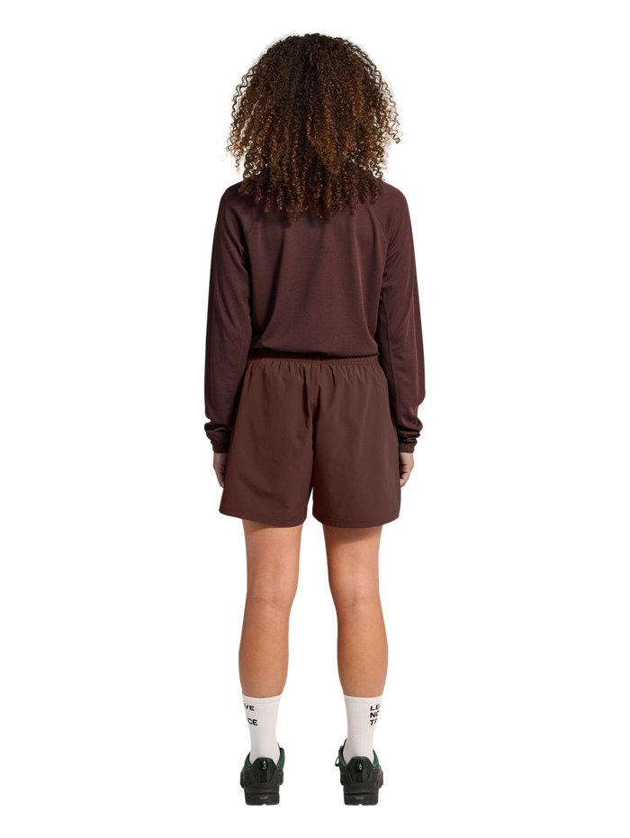 HALO SHORTS, BITTER CHOCOLATE, model